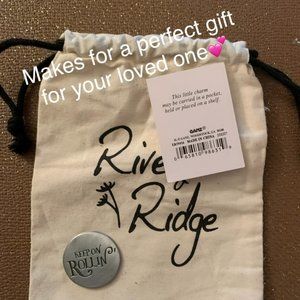Keep on rolling, ,,,  River Ridge pocket charm